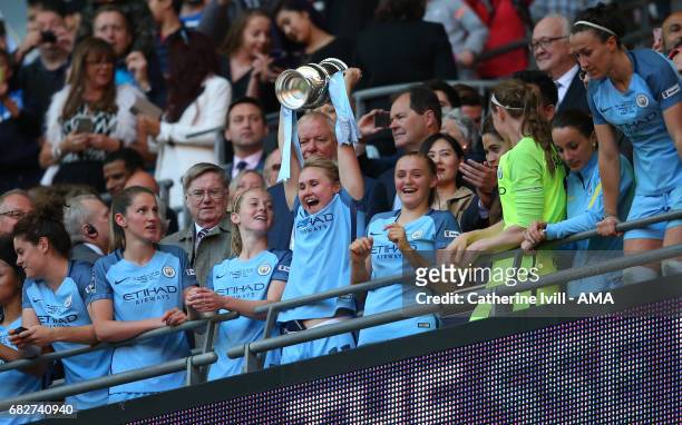 Isobel Christiansen of Manchester City Women celebrates with the trophy during the SSE Women's FA Cup Final between Birmingham City Ladies and...