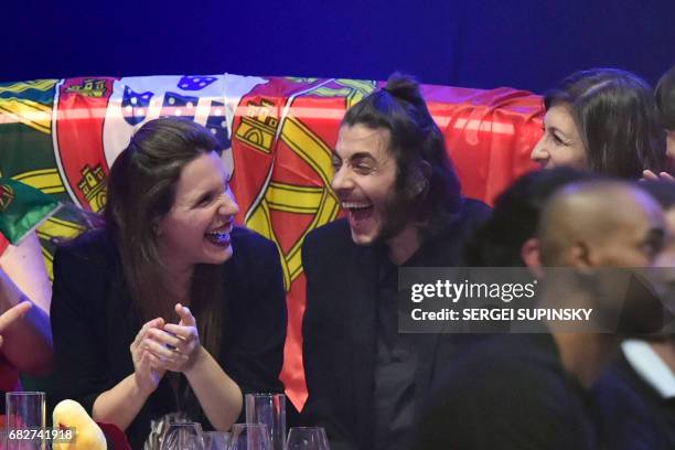 Portuguese singer representing Portugal with the song "Amar Pelos Dios" Salvador Vilar Braamcamp Sobral aka Salvador Sobral reacts, flanked by his...