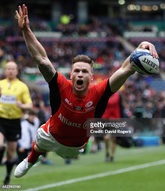 Chris Ashton of Saracens dives over for their first try during the European Rugby Champions Cup Final between ASM Clermont Auvergen and Saracens at...