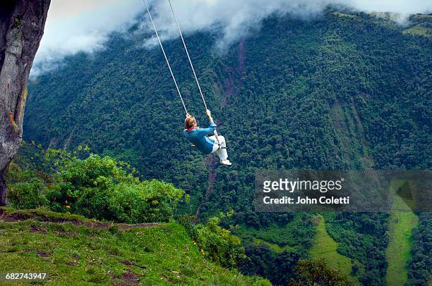 swing at the end of the world - ecuador stock pictures, royalty-free photos & images