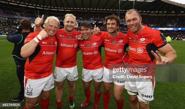 Petrus du Plessis, Vincent Koch, Schalk Brits, Marcelo Bosch and Schalk Burger of Saracens celebrate victory during the European Rugby Champions Cup...