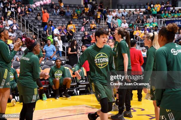 Ramu Tokashiki of the Seattle Storm high fives her teammate before the game against the Los Angeles Sparks on May 13, 2017 at STAPLES Center in Los...