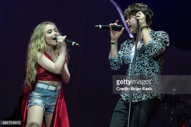 Sabrina Carpenter and Brad Simpson of The Vamps perform at The O2 Arena on May 13, 2017 in London, England.