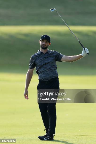 Kyle Stanley of the United States reacts to his second shot on the 16th hole during the third round of THE PLAYERS Championship at the Stadium course...