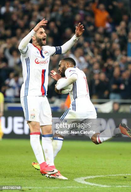Alexandre Lacazette of Lyon celebrates his goal with Maxime Gonalons during the UEFA Europa League, semi final second leg match between Olympique...