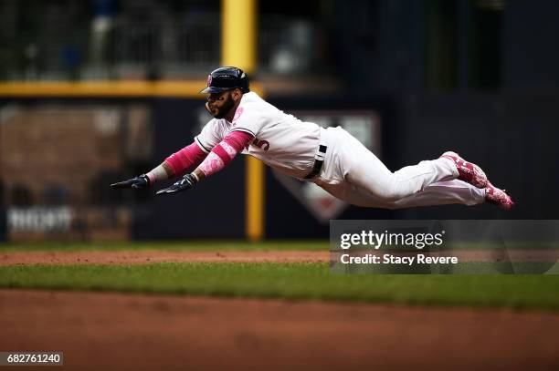 Jonathan Villar of the Milwaukee Brewers steals second base during the second inning of a game against the New York Mets at Miller Park on May 13,...