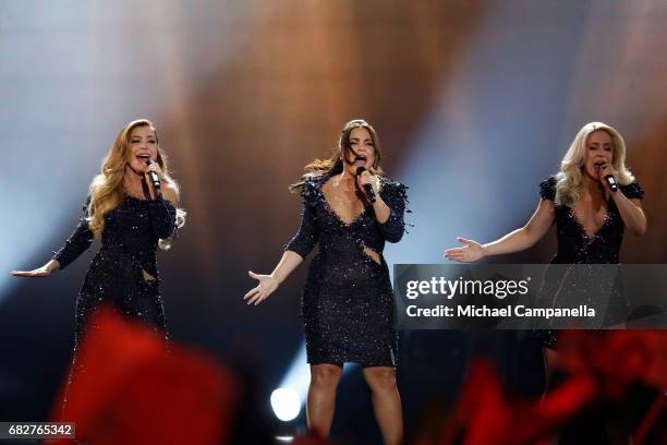 Amy, Shelley and Lisa Vol of the band OG3NE, representing the Netherlands, perform the song 'Lights and Shadows' during the final of the 62nd...