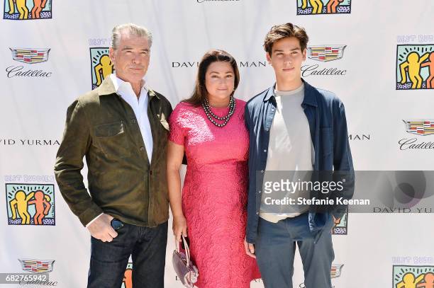 Pierce Brosnan, Keely Shaye Smith and Paris Brosnan attend Cindy Crawford and Kaia Gerber host Best Buddies Mother's Day Brunch in Malibu, CA...