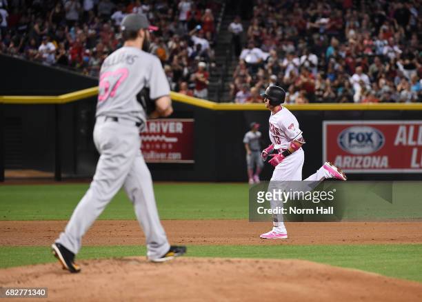 Nick Ahmed of the Arizona Diamondbacks rounds the bases after hitting a solo home run off of Trevor Williams of the Pittsburgh Pirates during the...