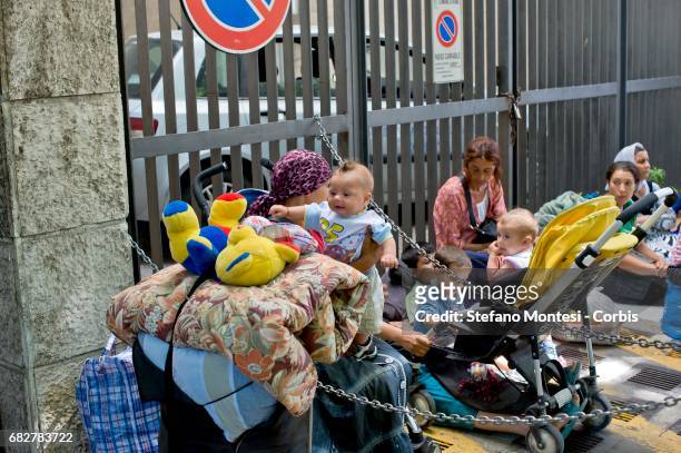 Roma, left homeless, wait at the social policies department to find a solution. Eviction the Roma camp behind Val D'Ala railway station, Monte Sacro...