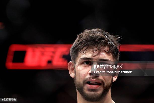 Yair Rodriguez suffers a cut under the eye during his Featherweight bout against Frankie Edgar during UFC 211 at American Airlines Center on May 13,...