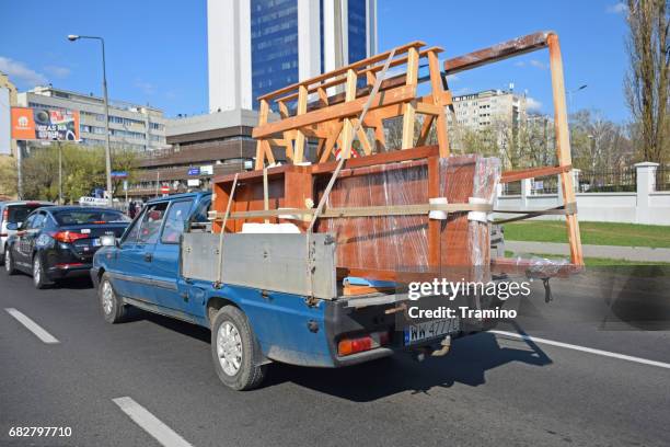 pick-up with furnitures on the street - strap stock pictures, royalty-free photos & images