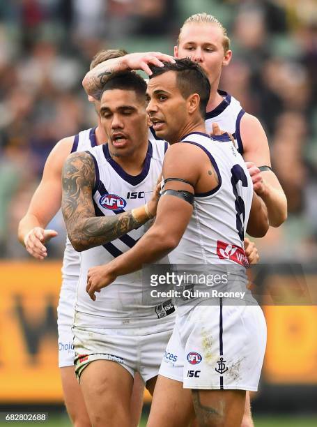 Danyle Pearce of the Dockers is congratulated by team mates after kicking a goal during the round eight AFL match between the Richmond Tigers and the...