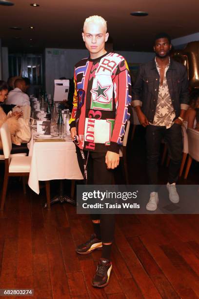 Model Joel Mignott celebrates Shaun Ross' 26th birthday at Fig & Olive on May 13, 2017 in West Hollywood, California.