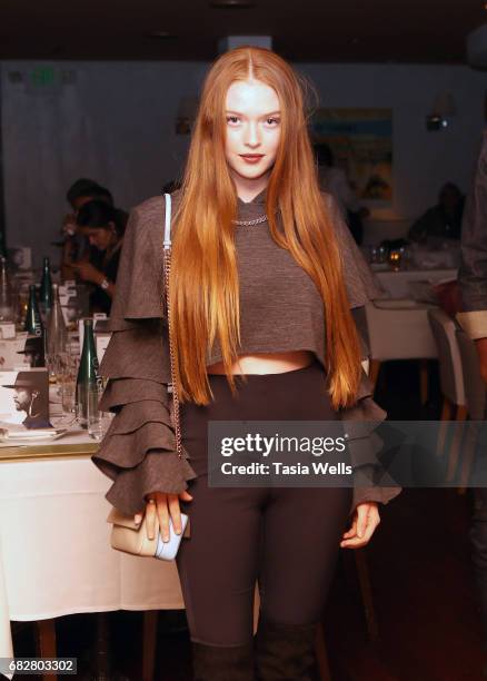 Model Larsen Thompson celebrates Shaun Ross' 26th birthday at Fig & Olive on May 13, 2017 in West Hollywood, California.