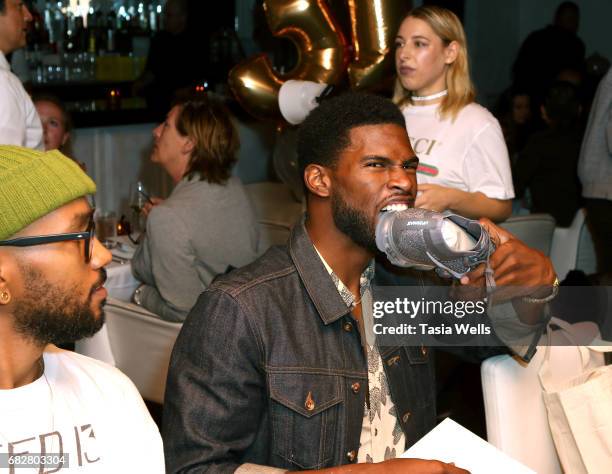 Model Broderick Hunter celebrates Shaun Ross' 26th birthday at Fig & Olive on May 13, 2017 in West Hollywood, California.