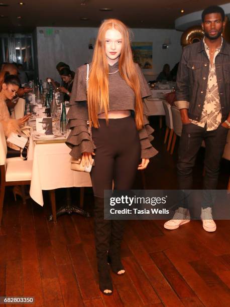 Model Larsen Thompson celebrates Shaun Ross' 26th birthday at Fig & Olive on May 13, 2017 in West Hollywood, California.