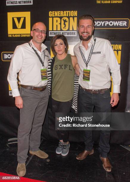 Professional bodybuilder Dana Linn Bailey poses with Executive Producers Nick Orton and Ollie Upton as she arrives to attend the premiere of...