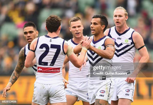 Danyle Pearce of the Dockers is congratulated by team mates after kicking a goal during the round eight AFL match between the Richmond Tigers and the...