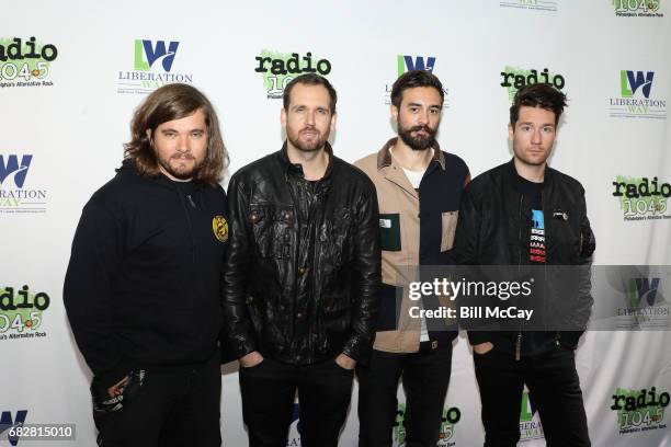 Chris Wood, Will Farquarson, Charlie Barnes and Dan Smith of the band Bastille pose at the BB&T Pavilion May 13, 2017 in Camden, New Jersey.