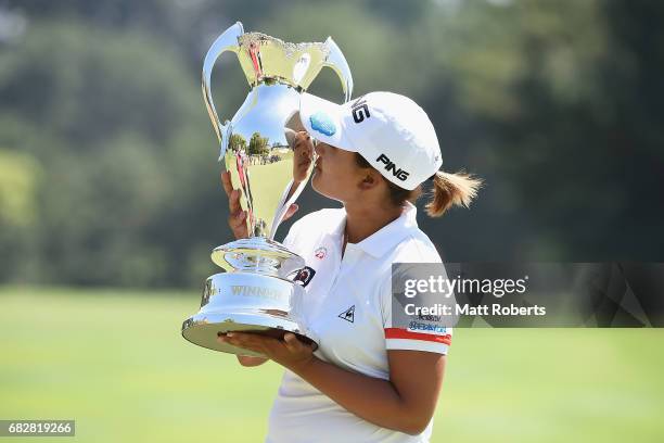 Ai Suzuki of Japan holds the winners trophy during the final round of the Hoken-no-Madoguchi Ladies at the Fukuoka Country Club Wajiro Course on May...