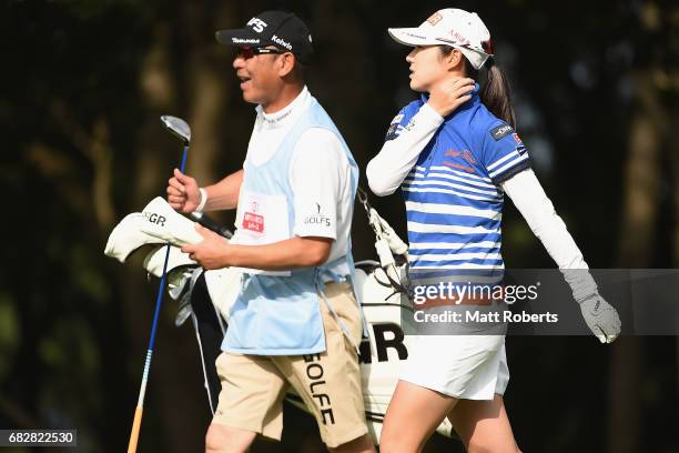 Rie Tsuji of Japan walks the 1st fairway during the final round of the Hoken-no-Madoguchi Ladies at the Fukuoka Country Club Wajiro Course on May 14,...