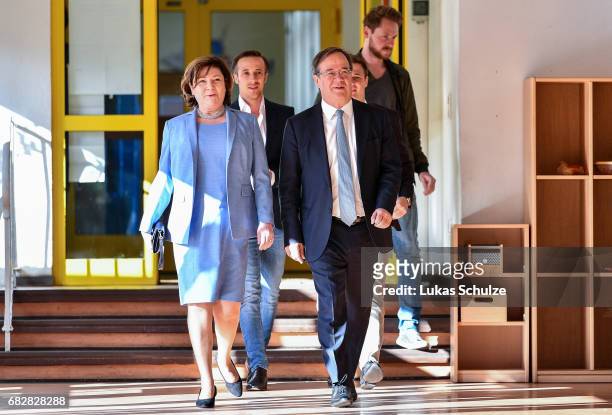 Armin Laschet, lead candidate of the German Christian Democrats arrives with his wife Susanne Laschet to casts his ballot in state elections in North...