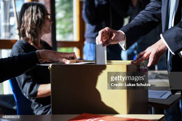 Armin Laschet, lead candidate of the German Christian Democrats , casts his ballot in state elections in North Rhine-Westphalia on May 14, 2017 in...