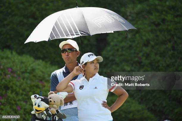 Ai Suzuki of Japan looks on before her tee shot on the 7th hole during the final round of the Hoken-no-Madoguchi Ladies at the Fukuoka Country Club...