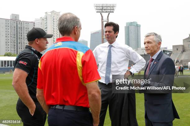 Michael Voss, Midfield Manager of the Power, Marcus Ashcroft, GM Football Operations of the Suns, Gillon McLachlan, Chief Executive Officer of the...