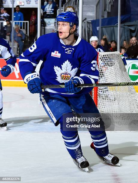 Colin Greening of the Toronto Marlies turns up ice against the Syracuse Crunch during game 4 action in the Division Final of the Calder Cup Playoffs...