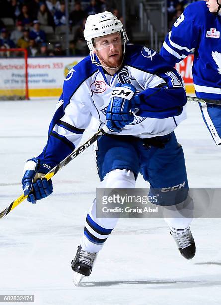 Erik Condra of the Syracuse Crunch skates up ice against the Toronto Marlies during game 4 action in the Division Final of the Calder Cup Playoffs on...