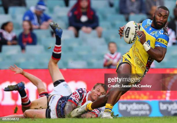 Semi Radradra of the Eels is tackled during the round 10 NRL match between the Sydney Roosters and the Parramatta Eels at Allianz Stadium on May 14,...