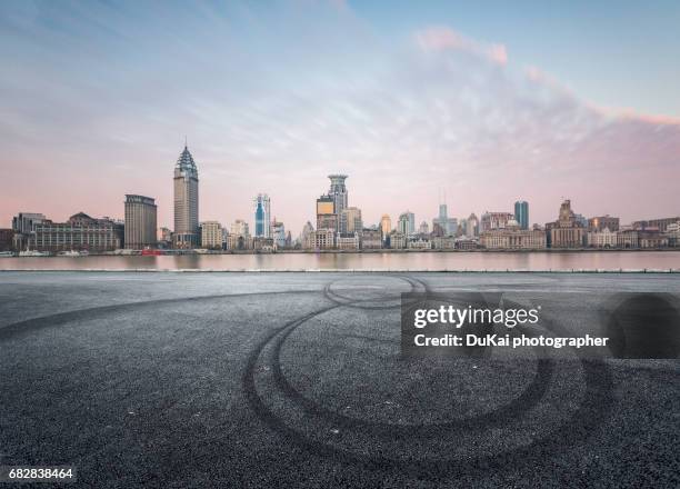 city parking lot - shanghai sunset stock pictures, royalty-free photos & images