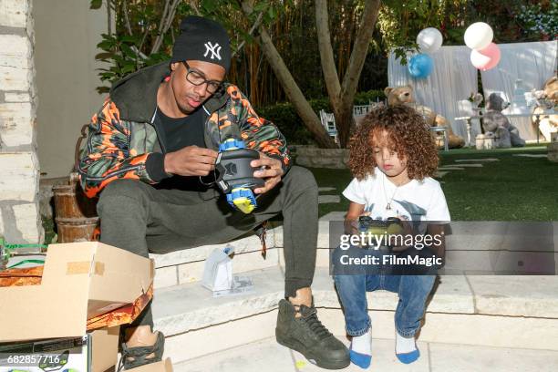 Actor Nick Cannon and Moroccan Scott Cannon attend the Moroccan Scott Cannon and Monroe Cannon Party on Mary 13 in Los Angeles, California.