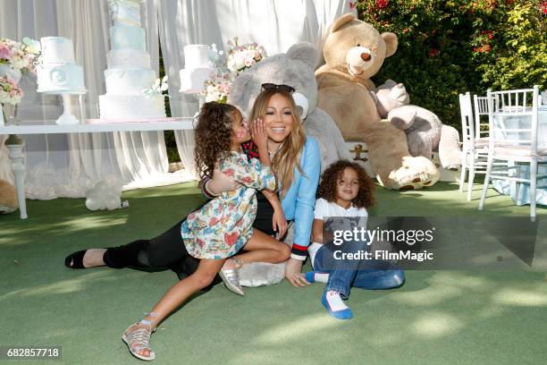 Monroe Cannon, Mariah Carey and Moroccan Scott Cannon attend the Moroccan Scott Cannon and Monroe Cannon Party on Mary 13 in Los Angeles, California.