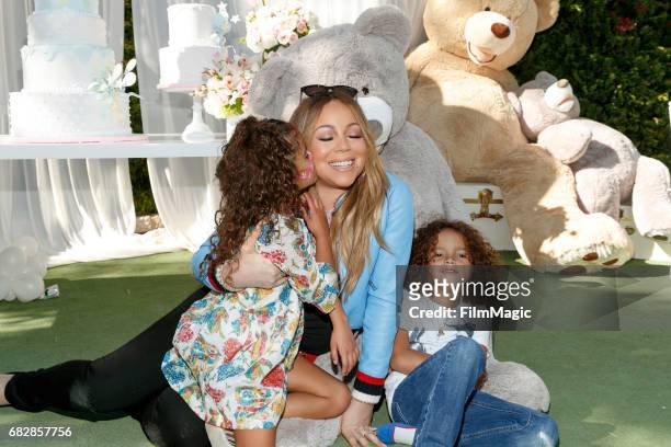 Monroe Cannon, Mariah Carey and Moroccan Scott Cannon attend the Moroccan Scott Cannon and Monroe Cannon Party on Mary 13 in Los Angeles, California.