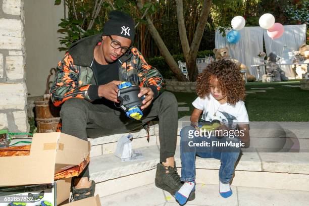 Actor Nick Cannon and Moroccan Scott Cannon attend the Moroccan Scott Cannon and Monroe Cannon Party on Mary 13 in Los Angeles, California.