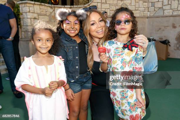 Singer Mariah Carey and Monroe Cannon attend the Moroccan Scott Cannon and Monroe Cannon Party on Mary 13 in Los Angeles, California.