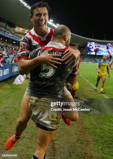 Blake Ferguson of the Roosters celebrates with Joseph Manu after scoring a try during the round 10 NRL match between the Sydney Roosters and the...