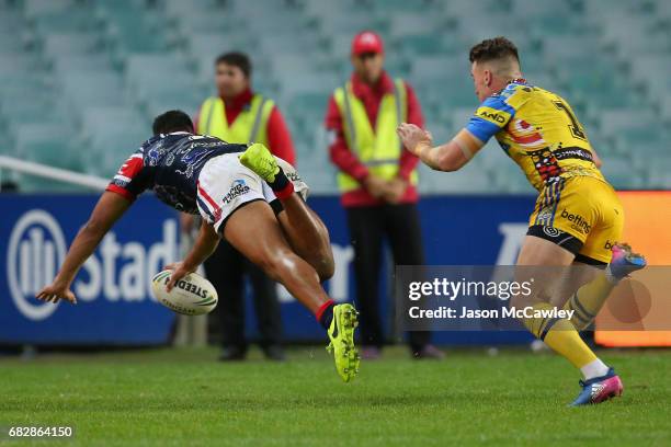 Daniel Tupou of the Roosters scores a try during the round 10 NRL match between the Sydney Roosters and the Parramatta Eels at Allianz Stadium on May...
