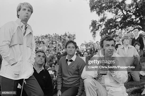 English golfer and non-playing captain, Tony Jacklin pictured right with Spanish golfer Manuel Pinero and English golfer Paul Way of Team Europe as...