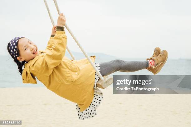playing on the swing - pendulum like stock pictures, royalty-free photos & images