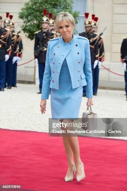 Brigitte Macron arrives at the Elysee presidential Palace prior to the handover between outgoing French President Francis Hollande and newly elected...