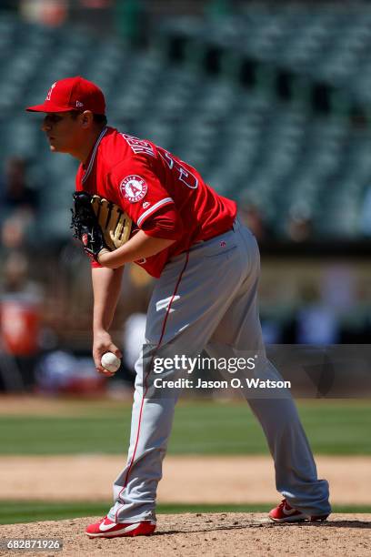 David Hernandez of the Los Angeles Angels of Anaheim stands on the pitchers mound against the Oakland Athletics during the eighth inning at the...
