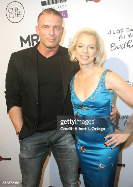 Actor/producer Jason Gibson and director Susan Walter arrive for the Premiere Of Penny Black Promotions' "A Little Something For Your Birthday" held...