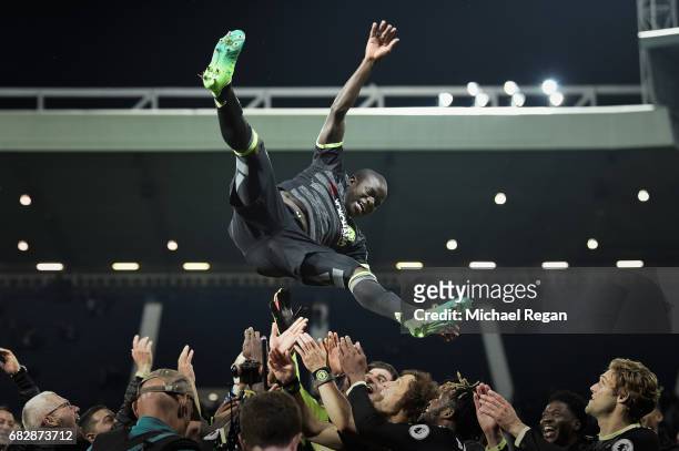 Golo Kante is thrown in the air by team mates as Chelsea celebrate winning the league after the Premier League match between West Bromwich Albion and...