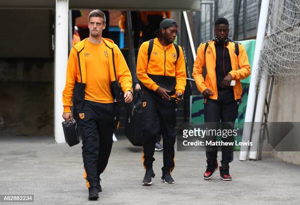 Markus Henriksen of Hull City , Dieumerci Mbokani of Hull City and Moses Odubajo of Hull City arrive at the stadium prior to the Premier League match...