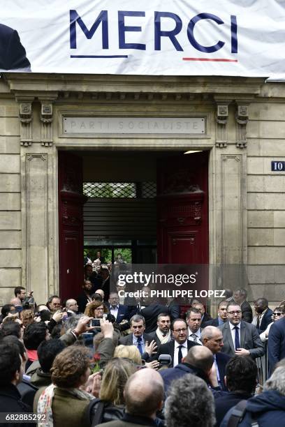 Former French President Francois Hollande leaves the French Socialist Party's headquarters, on May 14 in Paris after a visit following the handover...