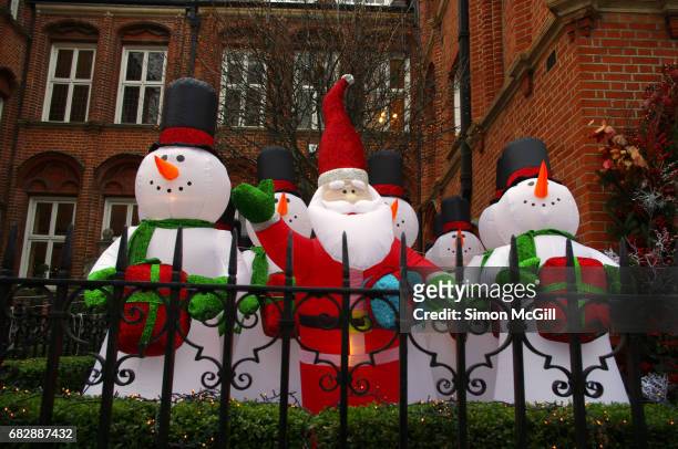 quirky moments - inflatable santa stock pictures, royalty-free photos & images